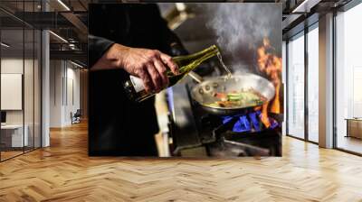 deglazing a pan with wine Wall mural