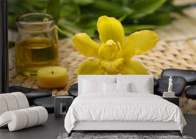 spa concept with orchid with spa stone, candle, massage oil Wall mural