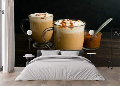 Coffee with milk topped with whipped cream and caramel sauce Wall mural