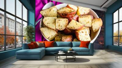 Tuscan Roasted Red Potatoes in a Serving Bowl: Roasted red potatoes coated in olive oil, spices, and garlic Wall mural