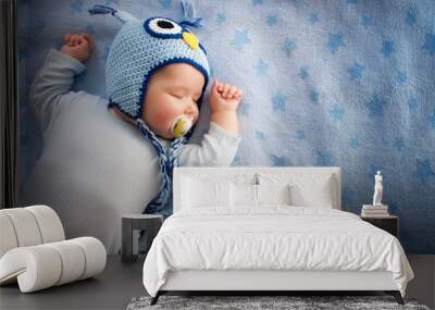 4 month old baby sleeping on blue blanket Wall mural