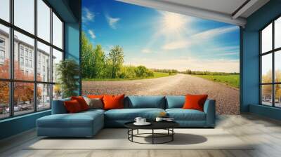 asphalt road panorama in countryside on sunny spring day Wall mural