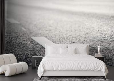 black asphalt road and white dividing lines Wall mural