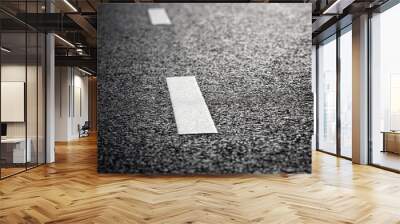 black asphalt road and white dividing lines Wall mural