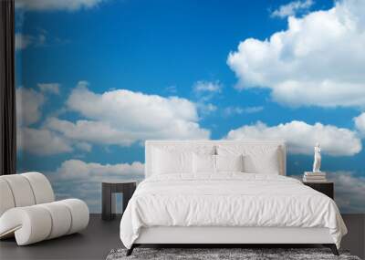 white clouds on the blue sky on sunny day Wall mural