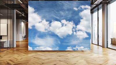 white fluffy clouds on blue sky in summer on sunny day Wall mural