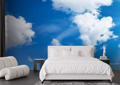 white fluffy clouds on blue sky in summer Wall mural