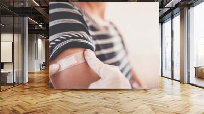 Woman and a doctor in the hospital after vaccination against Covid 19. Wall mural