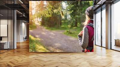 Woman hiking and going camping in nature Wall mural