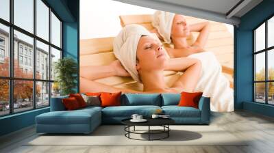 beauty spa room two women relax sun-beds Wall mural