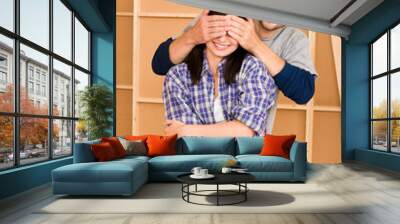 new house young happy couple closed eyes Wall mural