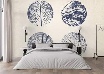 Tree rings pattern and leaf art overlaying tan or beige paper texture. Detailed outlines of botanical species of tree and leaves. Wall mural