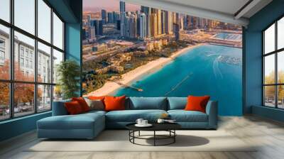 Aerial view of the city of Dubai; Dubai Marina view during vibrant sunset with skyscrapers and beaches Wall mural