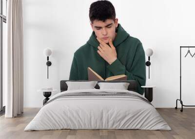 isolated boy with book on white background Wall mural