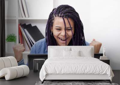 women celebrating enthusiastically with the portable computer Wall mural