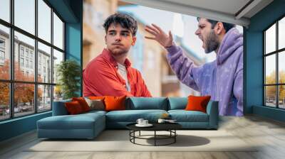 young people arguing in the street Wall mural