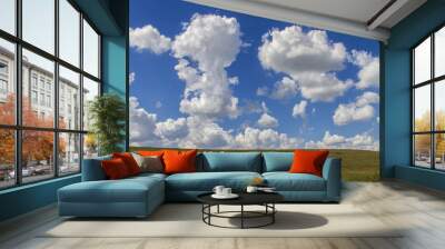 cumulus clouds in blue sky over the Flint Hills, Tallgrass Prairie National Preserve, Kansas Wall mural