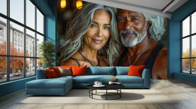 Portrait of a mature fit interracial couple married and in love. Wall mural