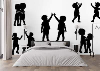 Stylish silhouette set of kids playing together Wall mural