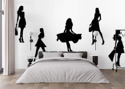 Stylish silhouettes of fashion ladies Wall mural