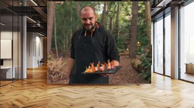 plate of shrimp cooked on the grill - chef shows his dish Wall mural