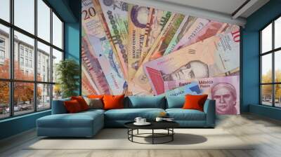 Banknotes from different countries in America. Latin America Wall mural