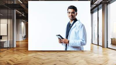 Portrait of a man in business suit, lab coat and protective glasses, holding leather folder, isolated on white studio background Wall mural