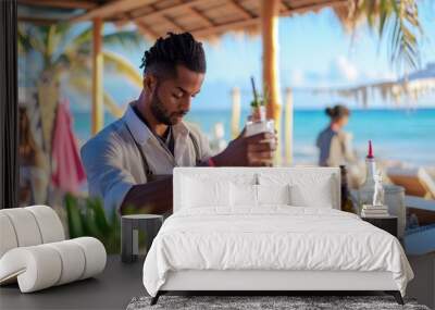 Barman preparing a cocktail in a beach bar Wall mural