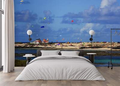 Kite festival on El Cotillo beach with a sunny day on the island of Fuerteventura Wall mural