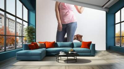 woman in studio posing with casual attire Wall mural