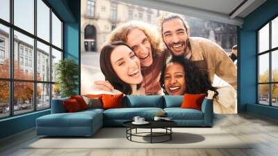 Group of four friends taking selfie with a smart phone. High quality photo Wall mural