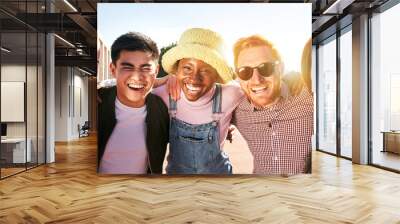 Smiling panoramic portrait of cheerful group of young people. Happy friends excited having fun. Interracial boys and girls taking picture looking at camera smart mobile phone. Enjoying vacations Wall mural