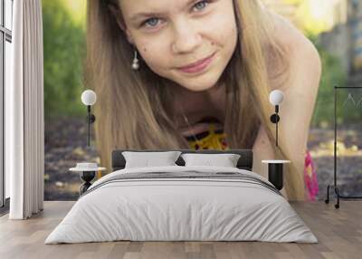 young teenage girl posing with a cute smile Wall mural