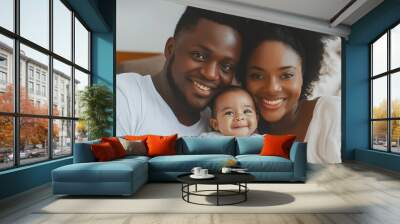 African-American couple, mother and father holding infant daughter, traditional nuclear family concept, copy space Wall mural