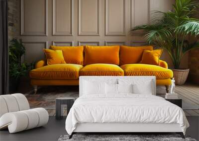 Contemporary yellow velvet sofa against  white wood paneled wall, natural light from window and tall potted plant, copy space Wall mural