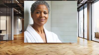 Portrait of African-American matue woman in white bath robe, daily spa and wellness care, copy space Wall mural