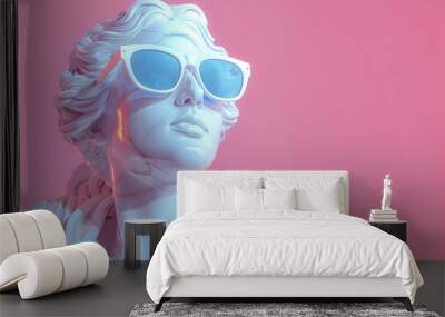 A white marble statue of ancient greek goddess wearing modern pink sunglasses on a pink background Wall mural