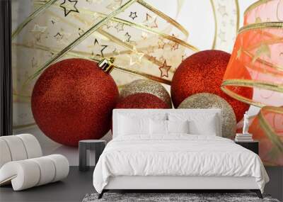 Gold and red Christmas baubles. Wall mural