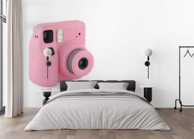 Closeup of pink instant photographic camera, isolated on white copy-space background. Wall mural