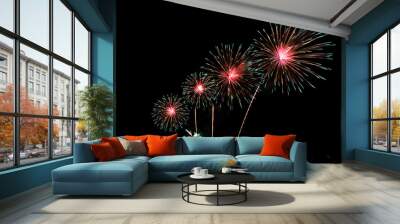 Colorful fireworks of various colors at night with celebration and anniversary concept Wall mural