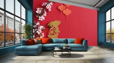 Chinese New Year, year of the rabbit. Year 2023 with golden rabbit and plum blossom fans. Copy space. Wall mural