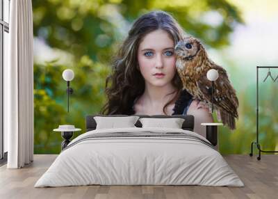 Beautiful young girl with owl Wall mural