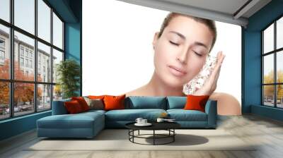 Spa Face Woman applies ice cubes on face. Healthy clean skin. Cold Beauty Treatments Wall mural