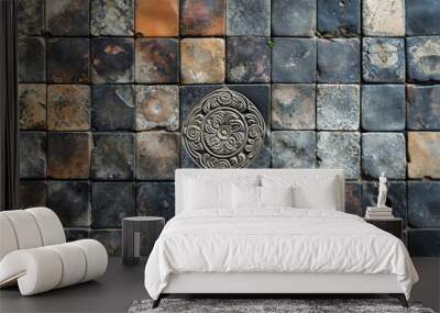 Tile array with central accent tile medalian, top down tiled floor pattern interior carved tile surface material texture, stock photo Wall mural