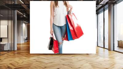 Full body of attractive young shopaholic holding many shopping b Wall mural