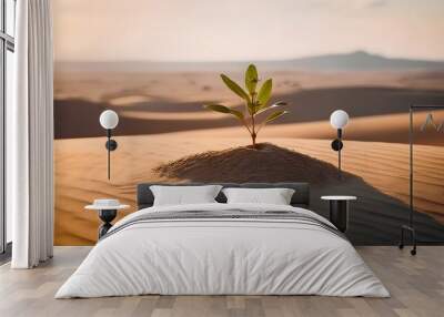 From the concept of starting over A sapling with green leaves grows in the desert under the bright sunshine. Wall mural