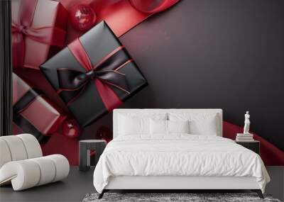 Red and black Christmas background concept Red and black ribbons wrapped around Christmas gift boxes Wall mural