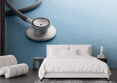 Stethoscope on blue background Wall mural