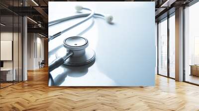 stethoscope on blue background Wall mural