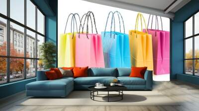 Plenty of colorful paper shopping bags on a white isolated background. Wall mural